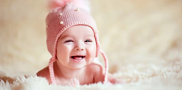 Chiropractic Nelson Tasman Happy Baby in Pink Hat