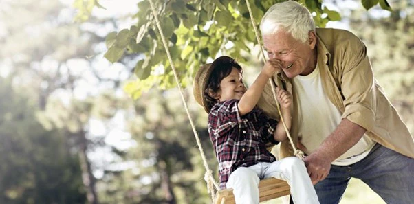 Chiropractic Nelson Tasman Pushing Grandson on Swing